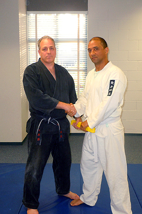 Nelson Receiving His Yellow Belt 06/08/2011